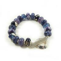 blue and purple glass bead bracelet with a silver toggle clasp