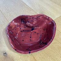 Red splattered bowl.