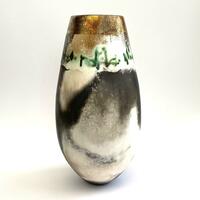 Tall vessel with gold and copper carbonate smoke-fired in sawdust.