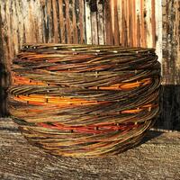 Contemporary rope coil woven willow large huggable log / blanket basket. Made from colourful, fiery Warwickshire Willow by Clare Shilvock (L:48cm x W:48cm x H:32cm)