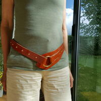 Dress belt in light tan, black or mid brown with another brass or stainless steel buckle and studs.