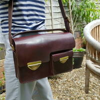 Classic brown or black bag with internal pockets