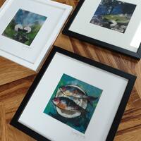 A selection of framed giclee prints from original textiles