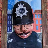 Jack as Laughing Policeman -papier mache relief