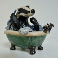 Bathin’ Badger ceramic sculpture 
