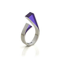 U.F.O Double conch. Sterling silver and translucent purple resin ring from the U.F.O, Unique Finger Ornaments, collection. The U.F.O collection is inspired by the forms, structures and colours of precious and semi-precious stones in their natural forms. . 