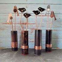 Recycled copper bird sculptures