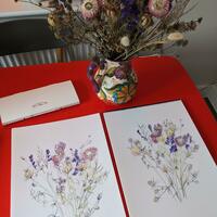 Drawing flowers at the kitchen table