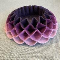 Geometric felted vessel created merino wool.