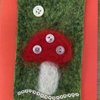 Felted toadstool with buttons. Greetings card