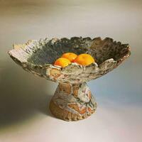 platter on pedestal, stoneware, dry green glaze