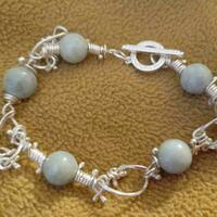 Silver bracelet with jadeite £60