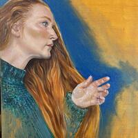 A self portrait oil painting. Woman with red hair wearing a green jumper stands in profile holding out her left hand. 