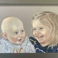 A pastel drawing of two children: a girl and a baby boy, laughing and smiling.