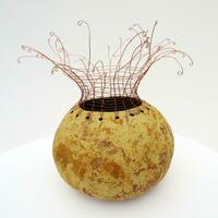 Stoneware pot with copper wire weaving