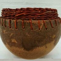 Stoneware pot with willow weaving. Join project with Clare Shilvock @warwickshirewillow