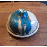 Stoneware butterdish with dripped turquoise glaze