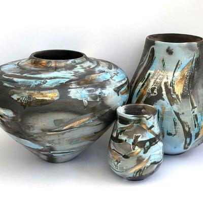 Luxury ceramic pots, smoke-fired with gold lustre.