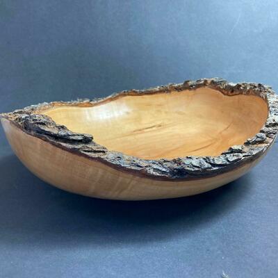 Natural edged turned wooden bowl