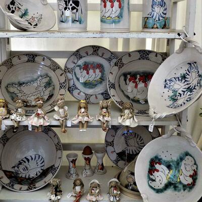 Handmade and hand decorated stoneware pottery  also some mixed media paintings 