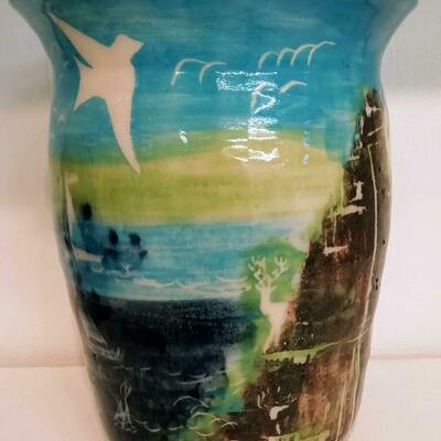 Large thrown pot with coloured porcelain slips  with a beautiful turquoise glaze inside.