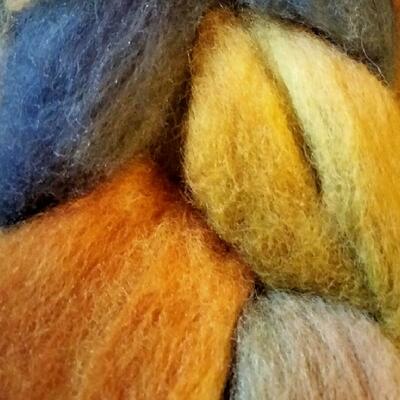 Hand dyed wool roving ready to spin