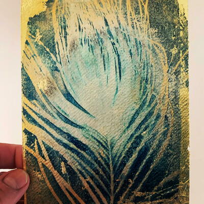 Peacock feather. Cyanotype and gold leaf.