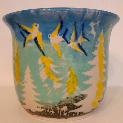 Birds in the forest, large plant pot, hand decorated with stained porcelain slips,stencilled on the surface then more deoration using sgraffitotechnique.  This strong hand thrown stoneware pot, approx 12 inches tall, and 9 inches diameter.  This will retail at £80.