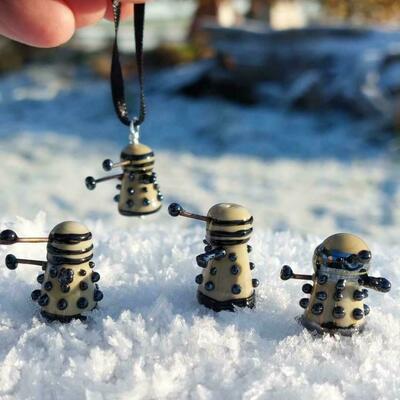 Tiny glass Daleks