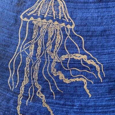 Gold jellyfish Lino print on indigo wash cotton rag paper