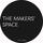 The Makers space text on a large charcoal grey circle background