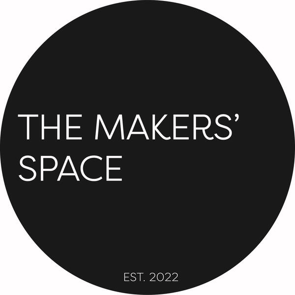 The Makers space text on a large charcoal grey circle background