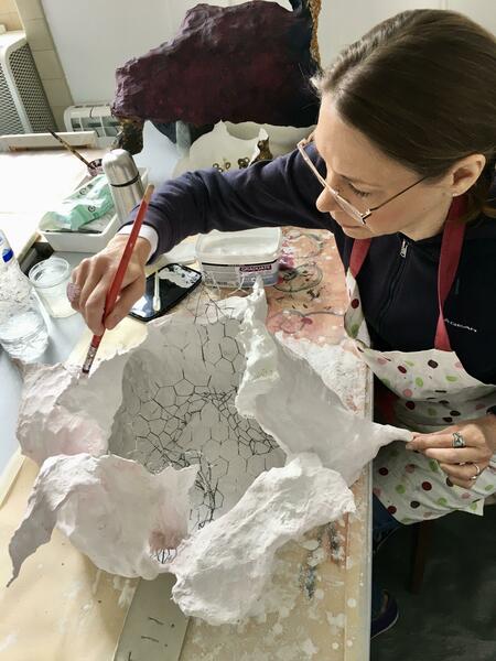 Working on plaster and wire sculpture at Grid Studios. 