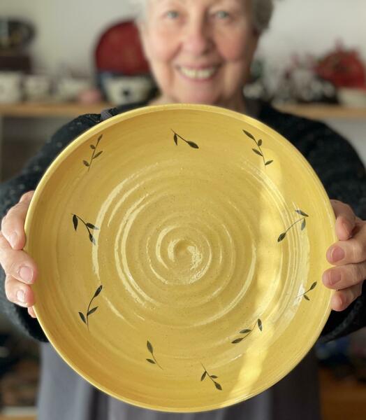 Sheila with large yellow fruit bowl