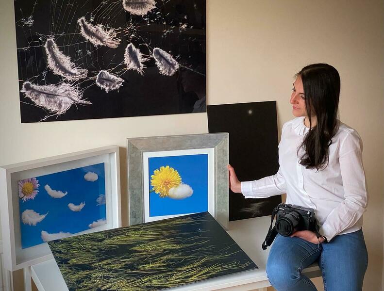 Alessia Sissa surrounded by some of her works