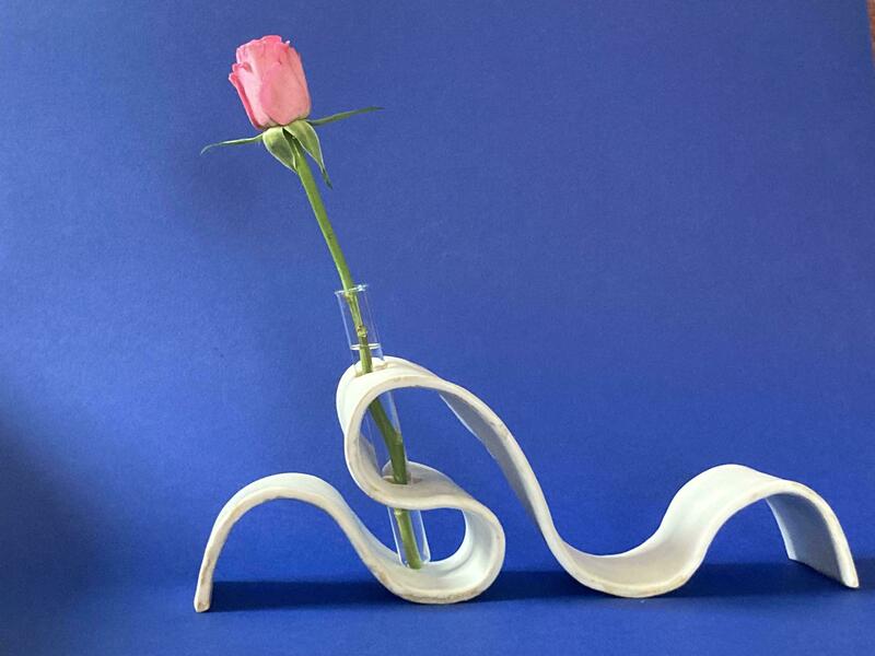 Single stem flower sculpture.