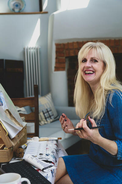 Artist Janet Bird at work in her home studio
