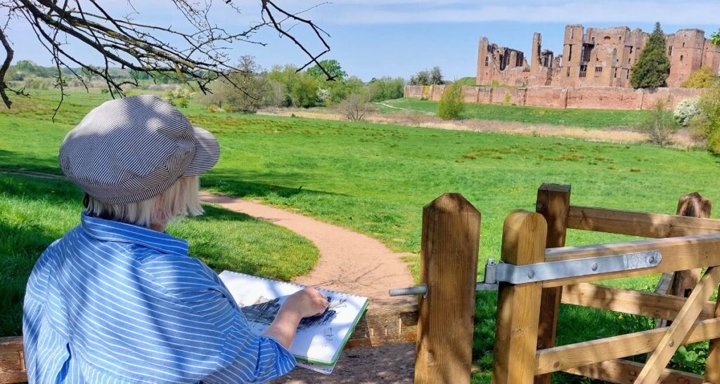 Jane sketching on a sunny day at Kenilworth Castle