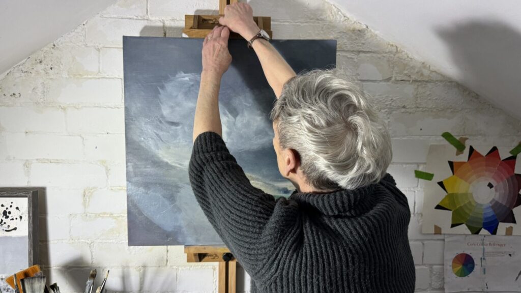 Chris Doherty preparing work on an easel