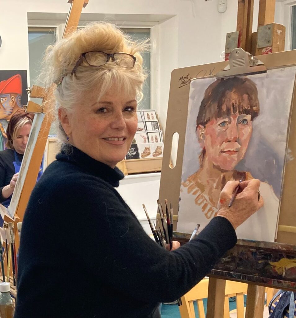 Portraits were my first love in art. Here I am painting a portrait from life of Chair Kate Rolfe of Stratford upon Avon District Council