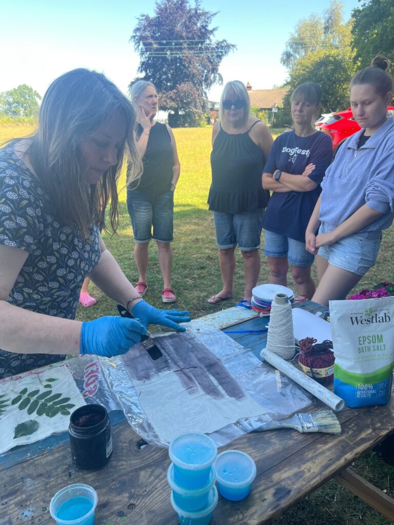 Carla demonstrating techniques at a Plein Air Ecoprint workshop