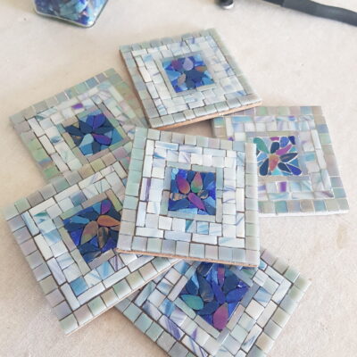 Set of 6 coasters, commissioned. Mosaiced using iridescent vitreous glass tiles