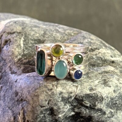 Sterling silver stacking ring set with blue and green gemstone mix