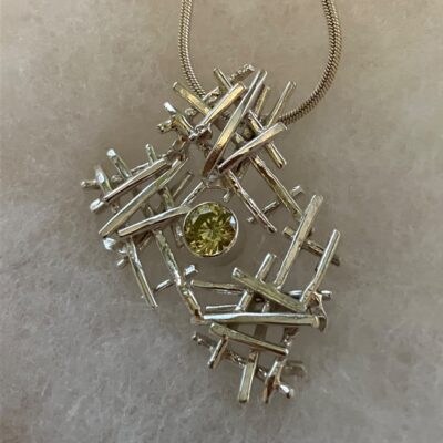  Part of the new Pick Up Stix collection, based on the kids game of throwing stix in the air.  This collection enjoys that chaos with the juxtaposition of beautifully set stones.