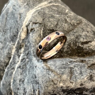 Blue and lilac sapphires in 18ct white gold ring