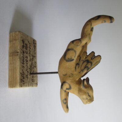 Poet's Cat ~ quote from H. D. Thoreau ~ high-fire stoneware with oxides and stain, burned wood base with metal rod