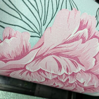 Sarah Bernhardt reduction linocut on the press.