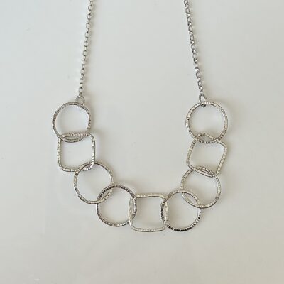 A silver hallmarked design necklace