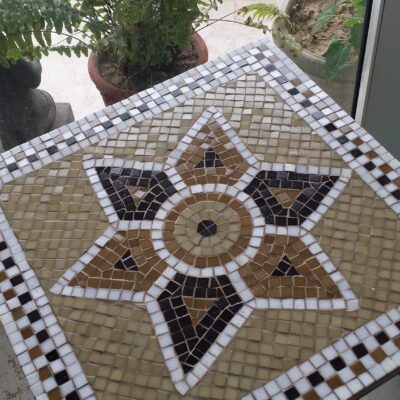 Roman mosaic inspired table. 12 inches by 12 inches