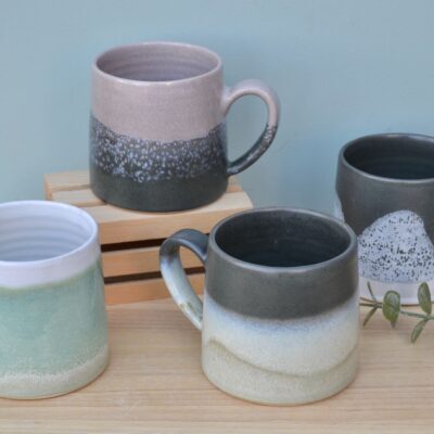  Hand thrown mugs in my glaze variations